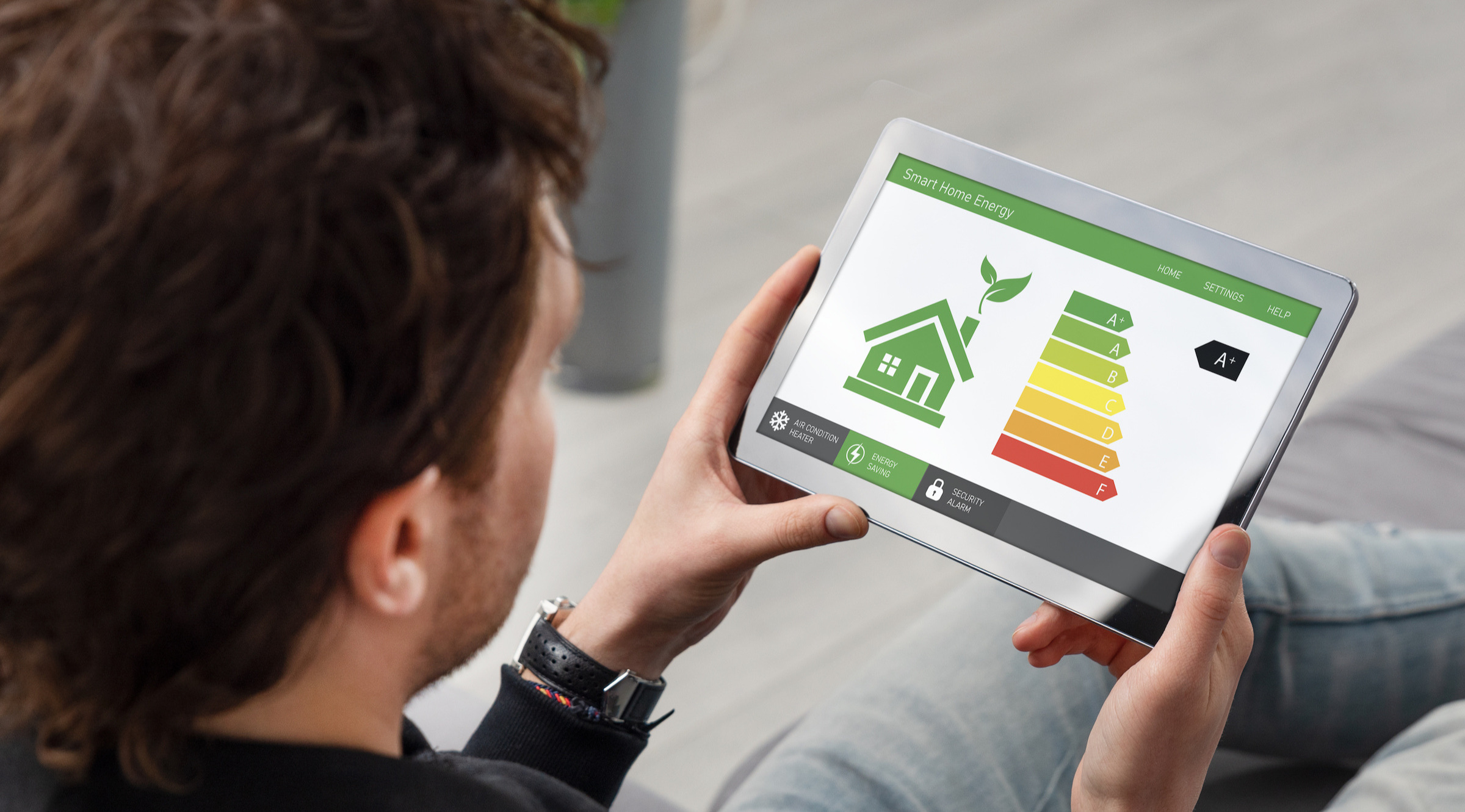 A man looking at a house energy efficiency rating
