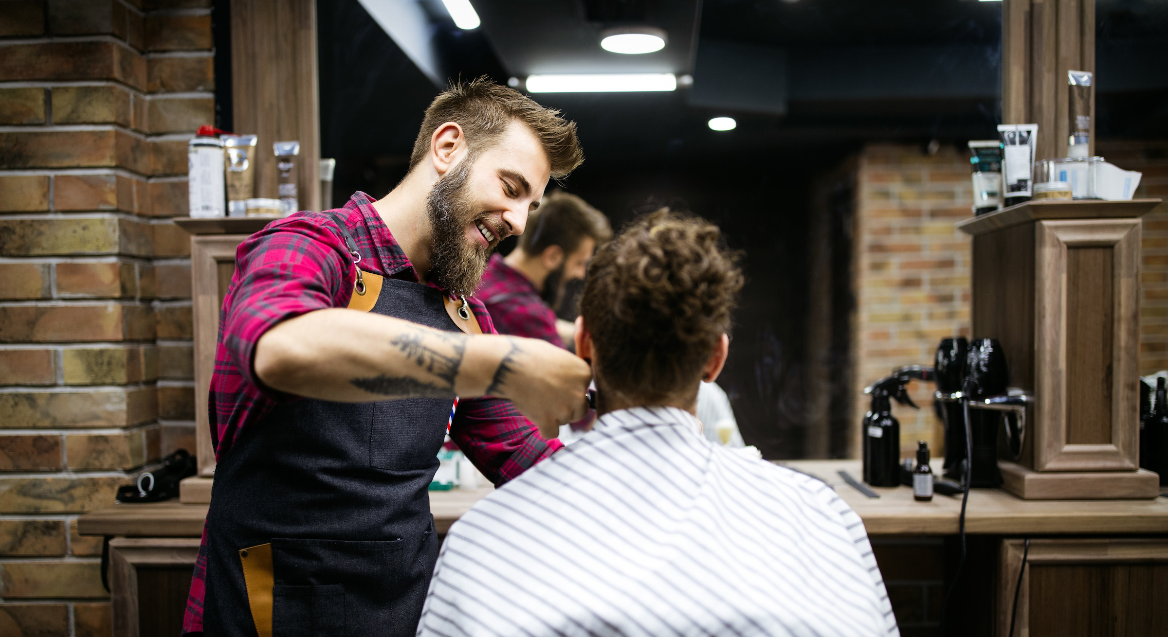 Man getting a haircut at a barber shop
