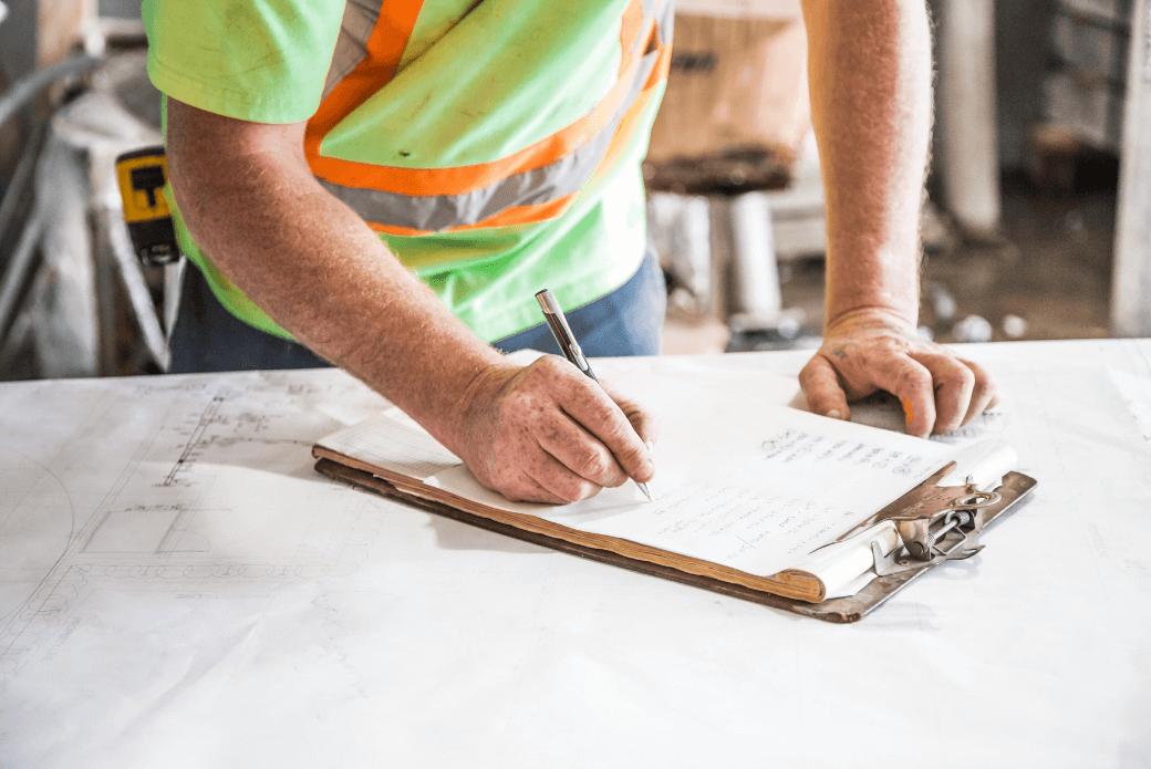 Construction worker doing paperwork