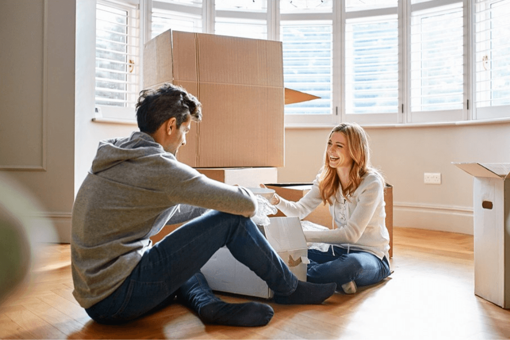 Couple with moving boxes
