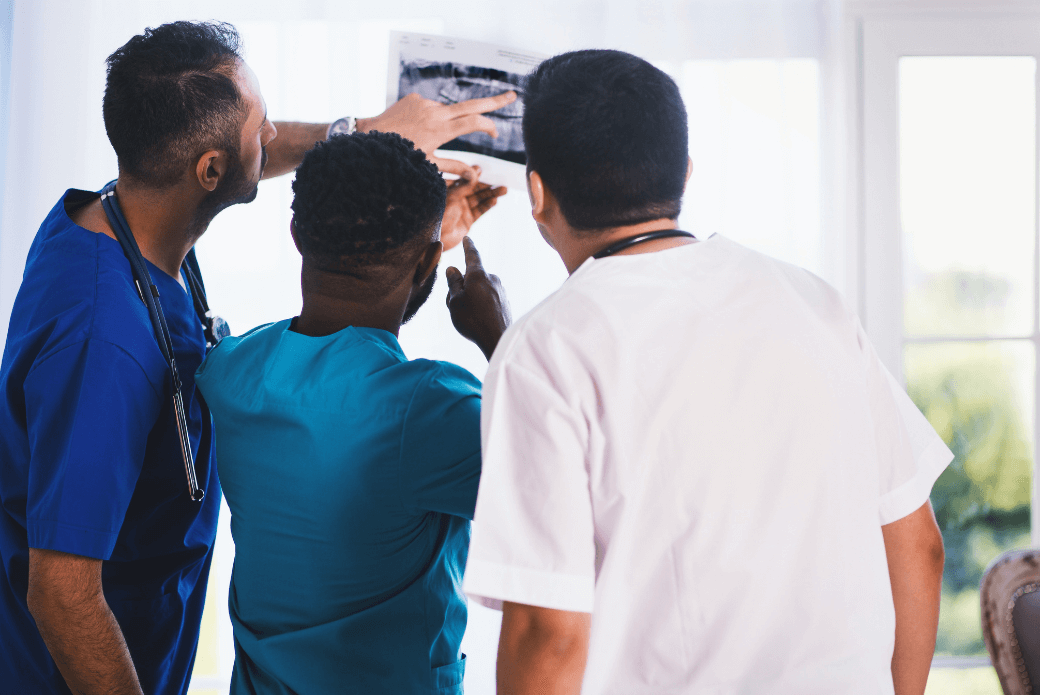 Doctors looking at x-ray