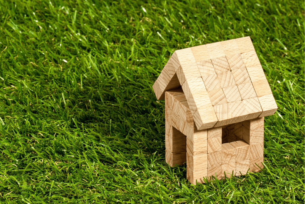 Wooden house on grass