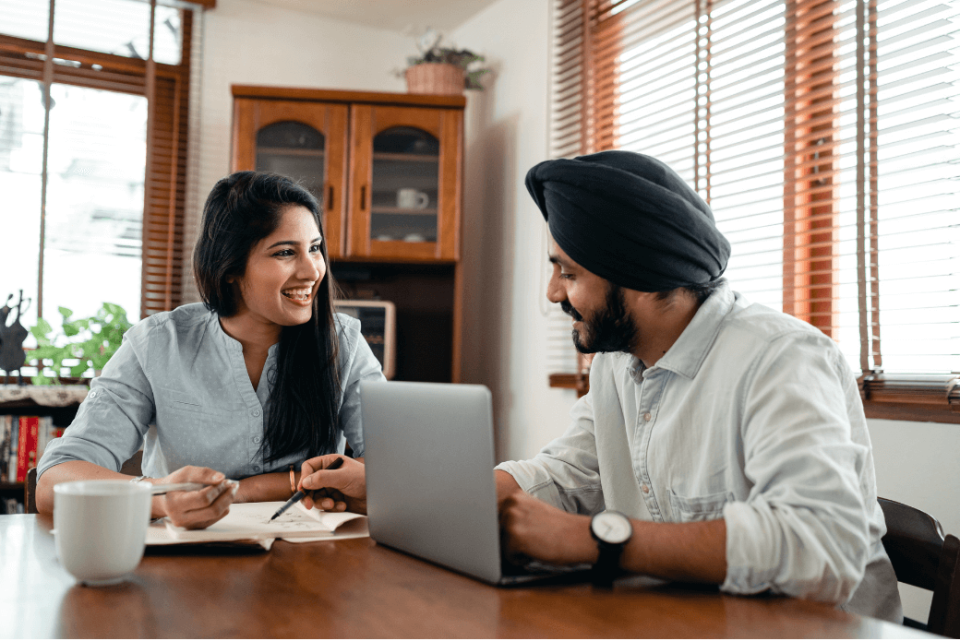 Couple at computer together