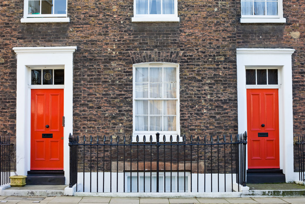 Brick Facade with Red Front Doors