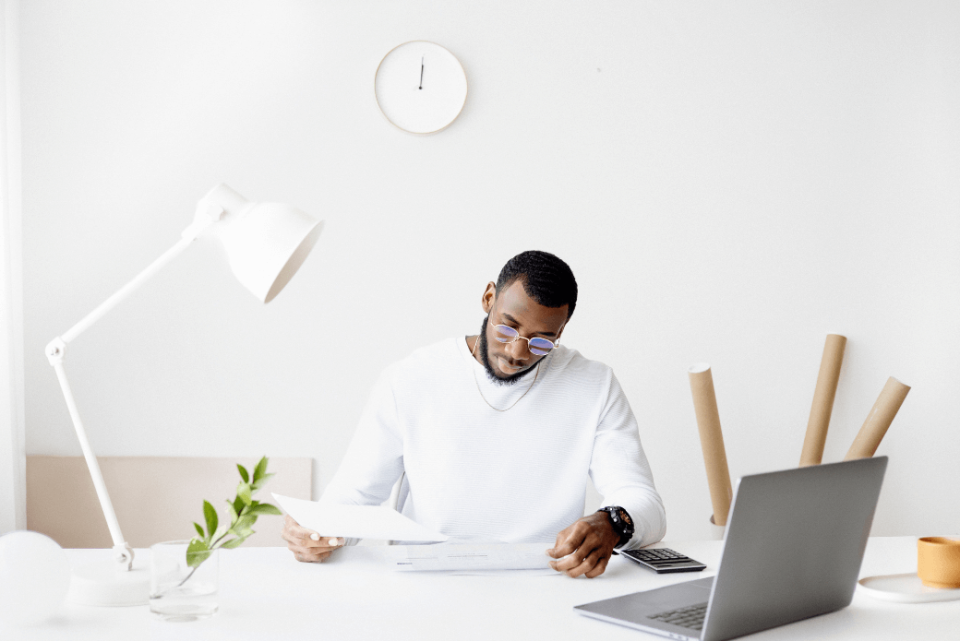 Man using calculator